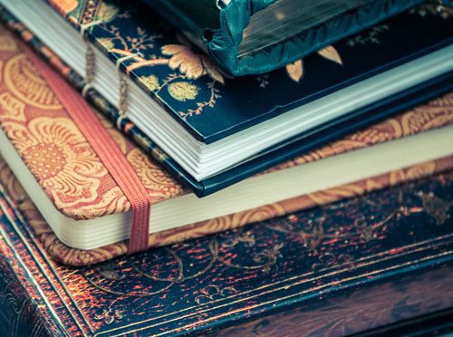 Keeping-a-Meditation-Journal - stack of ornate journals